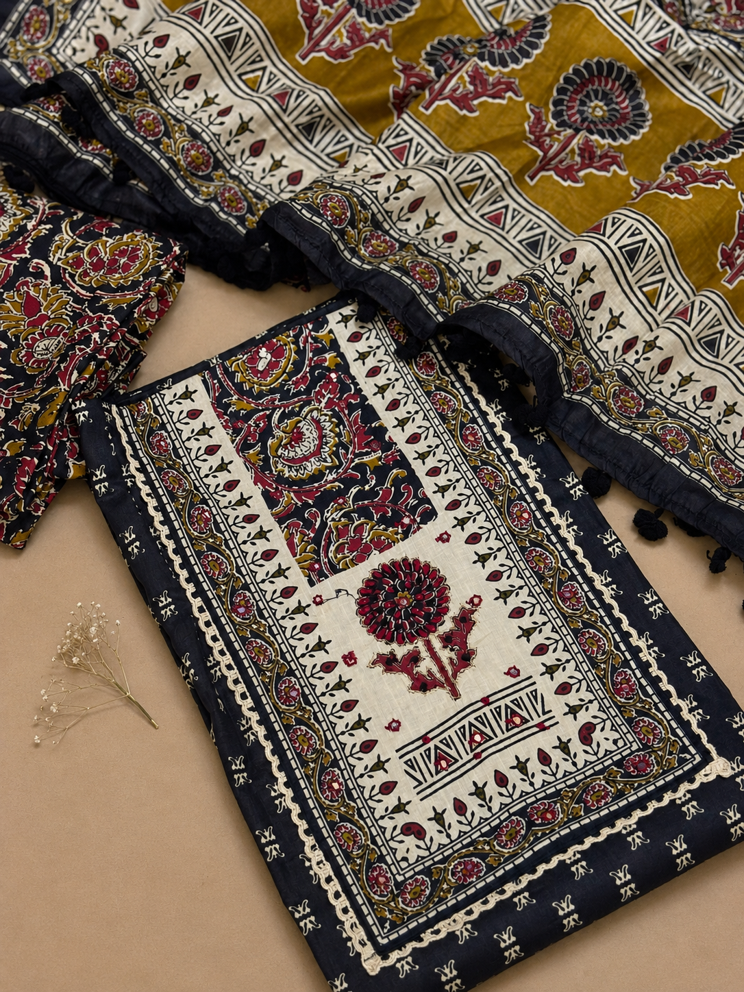 kesar unstitched suit