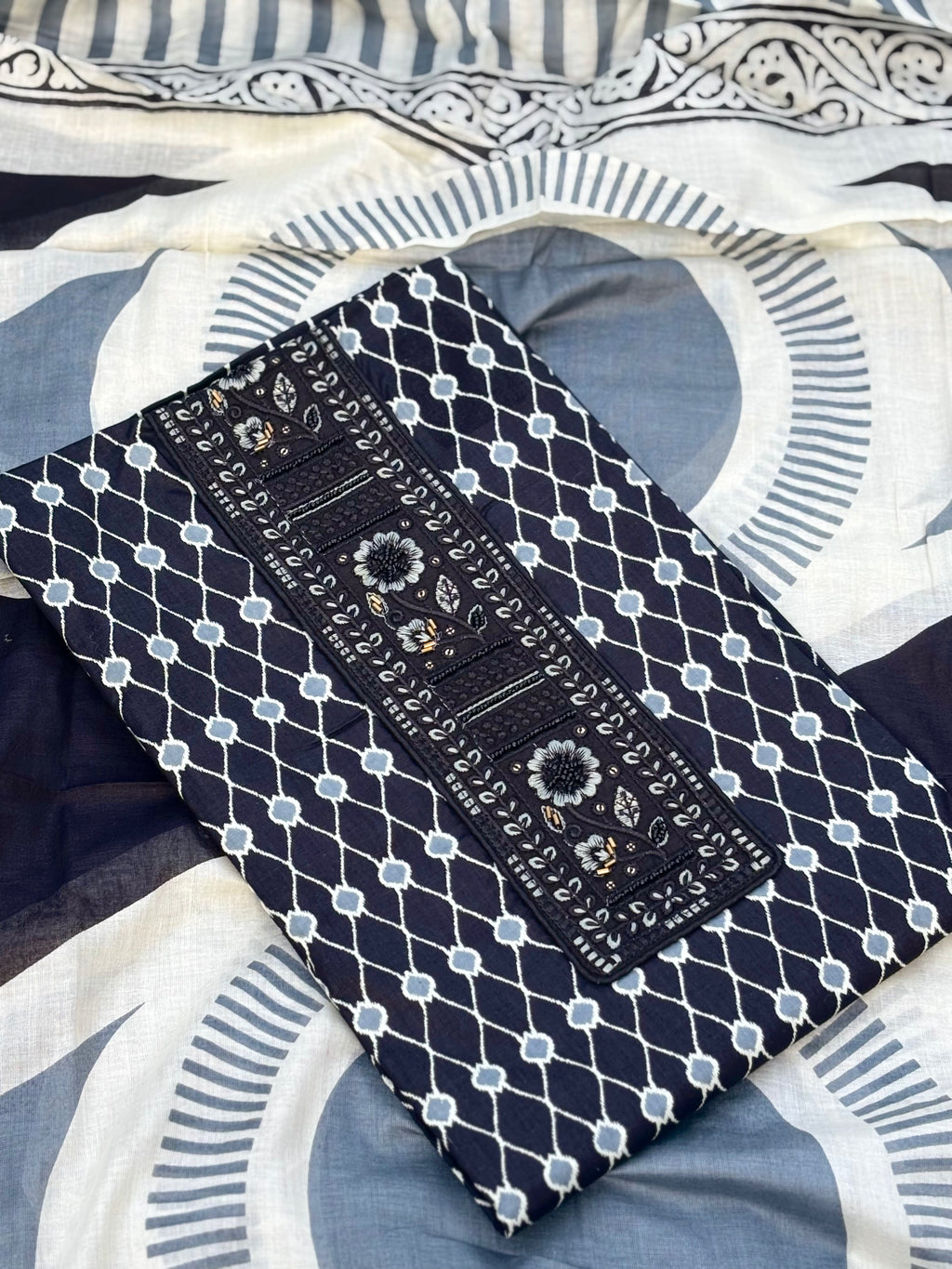 Black unstitched suit